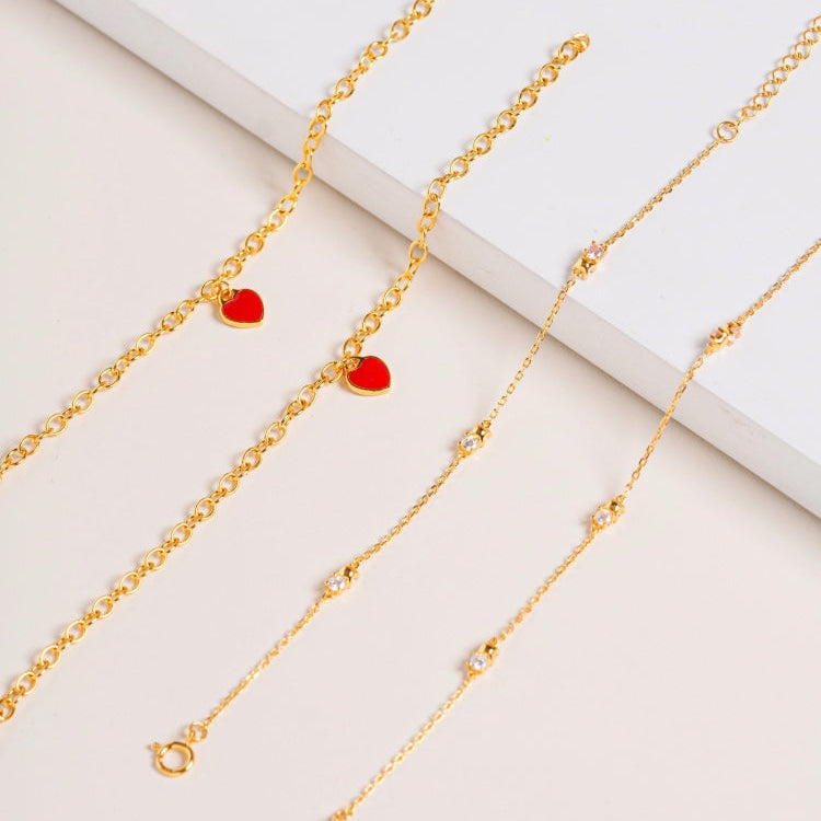 two vermeil Bracelet in flat lay against cream background