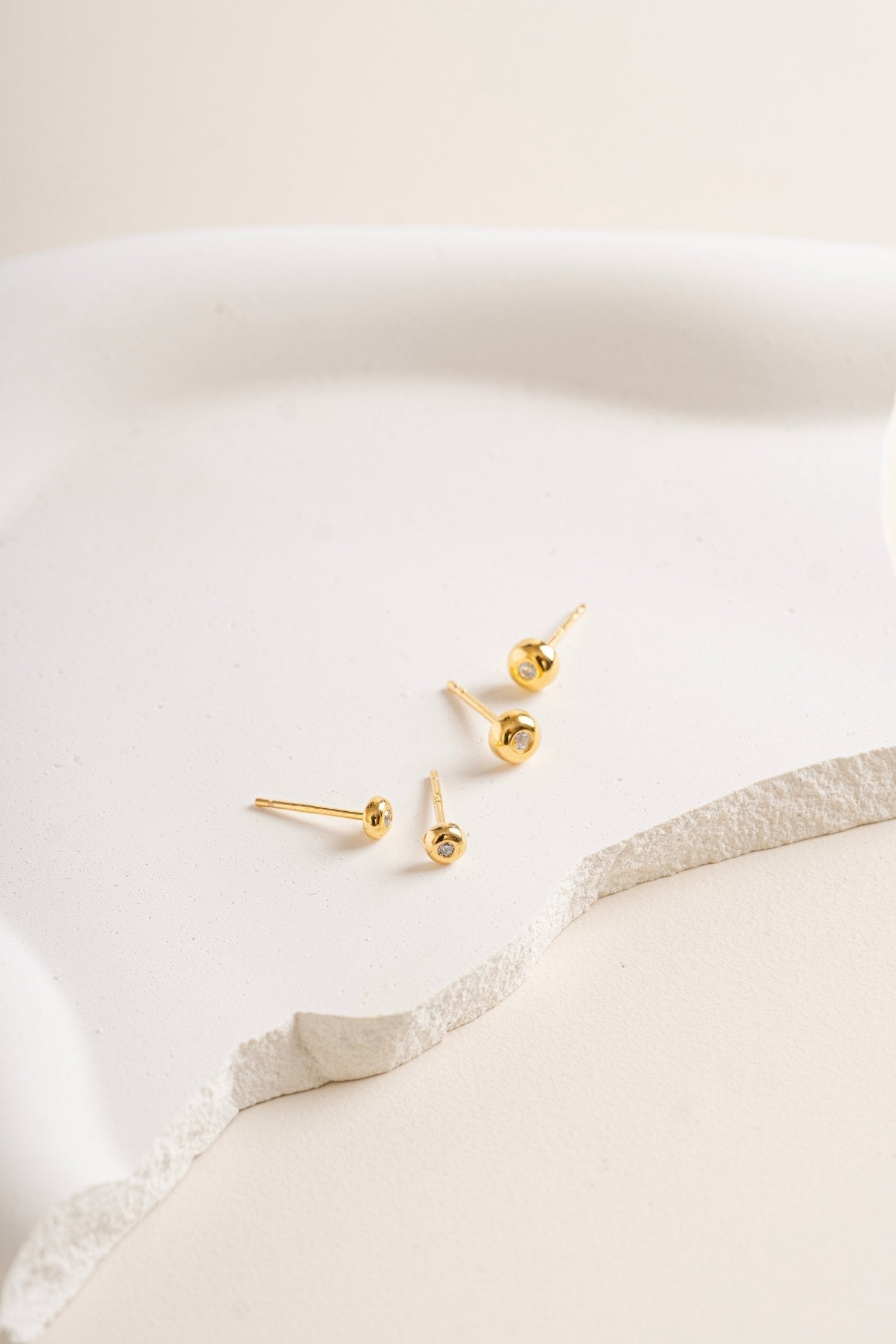 Twinkle Circle Studs in the flat lay creative pictures