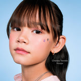 Girl wearing Chelsea Twinkle Hoops, 18K gold vermeil kids hoop earrings with cubic zirconia