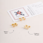 Blue Francis Butter Hudson Butterfly Studs in solid 14K gold with pale yellow enamel, shown alongside pink and white pairs.