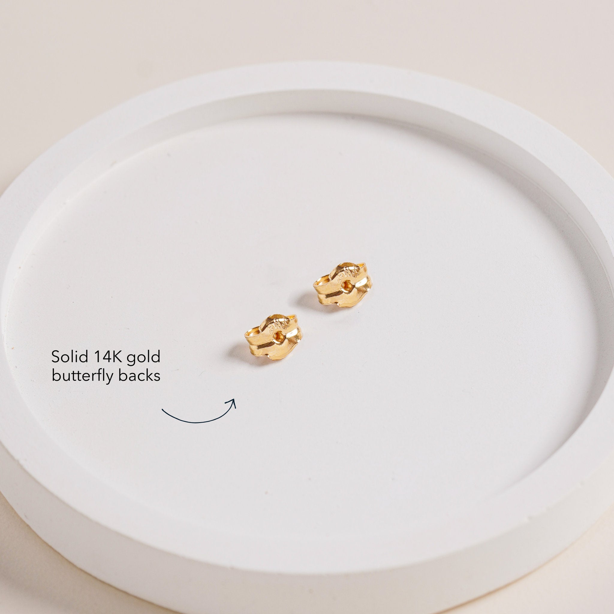 Solid 14K gold butterfly backs for Blue Francis Butter Hudson Butterfly Studs, shown as a pair on a white tray.