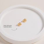Pair of solid 14K gold butterfly backs for Blue Francis Pink Hudson Butterfly Studs, pictured on a round white tray.