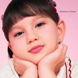 Girl wearing Gramercy Hoops, sterling silver kids hoop earrings with cubic zirconia