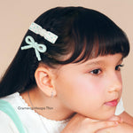 Girl wearing Gramercy Hoops Thin, kids hoop earrings with cubic zirconia