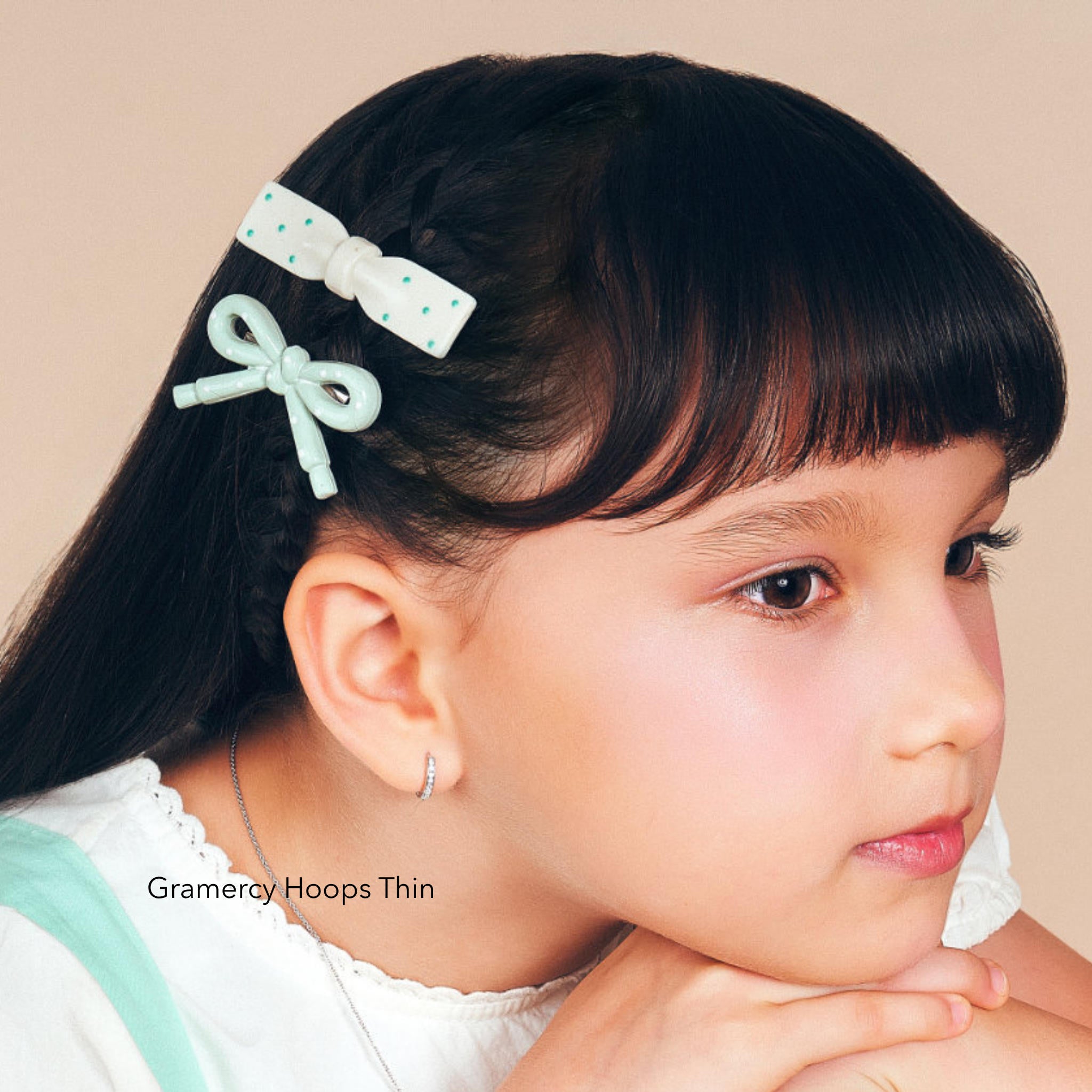 Girl wearing Gramercy Hoops Thin, kids hoop earrings with cubic zirconia