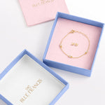 Blue Francis Hudson Butterfly Set in a gift box: gold butterfly stud earrings and Twinkle Bracelet