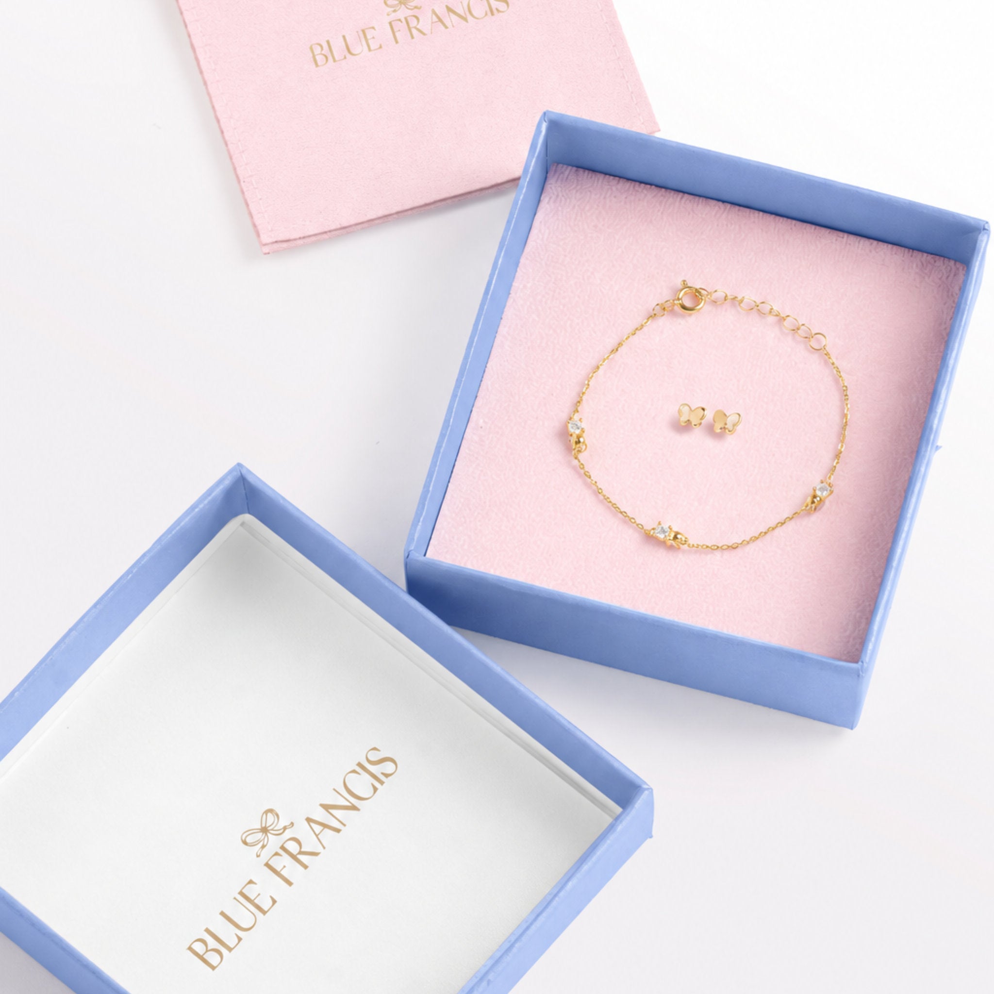 Blue Francis Hudson Butterfly Set in a gift box: gold butterfly stud earrings and Twinkle Bracelet
