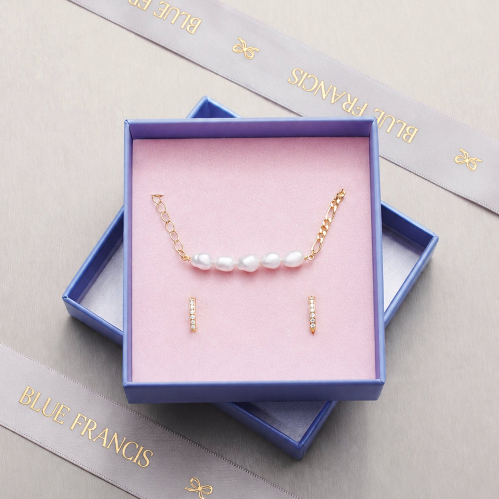 Blue Francis Melodie Pearl Set in a blue gift box: freshwater pearl bracelet and gold vermeil kids hoop earrings