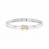 Blue Francis Melodie Butter Fleur Bangle, a sterling silver hinged bangle with butter yellow enamel daisies