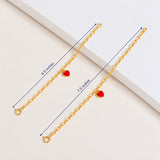Blue Francis Red Central Heart Bracelets in gold vermeil with red enamel charms, comparing 6.5-inch and 7.5-inch lengths.