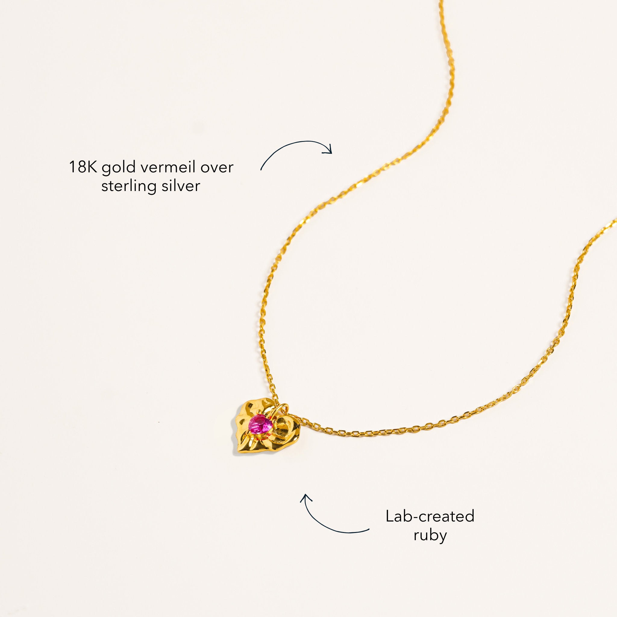 Blue Francis Ruby Liberty Necklace in 18K gold vermeil over sterling silver, with a sculpted pendant and lab-created ruby.