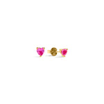 Blue Francis - Ruby Liberty Studs - Heart-shaped pink ruby synthetic gemstone earrings with gold vermeil settings on a white background