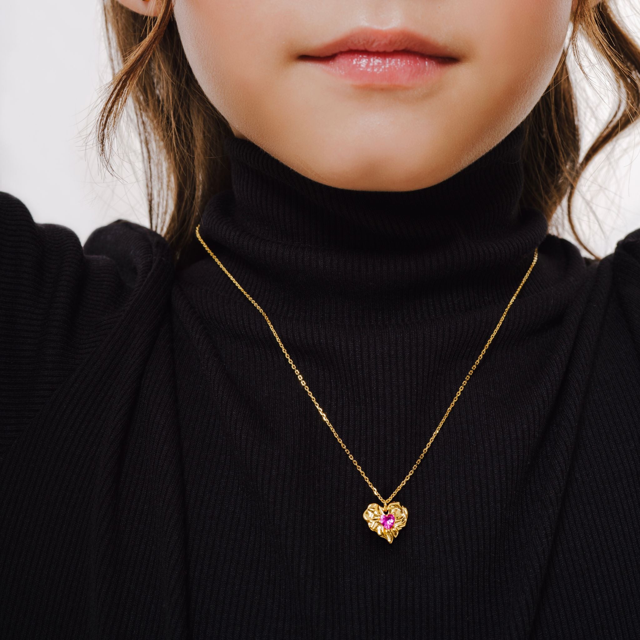 Blue Francis Kids Necklace in Vermeil 18K called Ruby Liberty Necklace. Blue Francis model wearing black shirt wearing Necklace in Vermeil Gold.