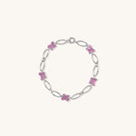 Brooklyn Butterfly Bracelet in sterling silver with pink enamel, shown flat on neutral background with bright lighting for detail.