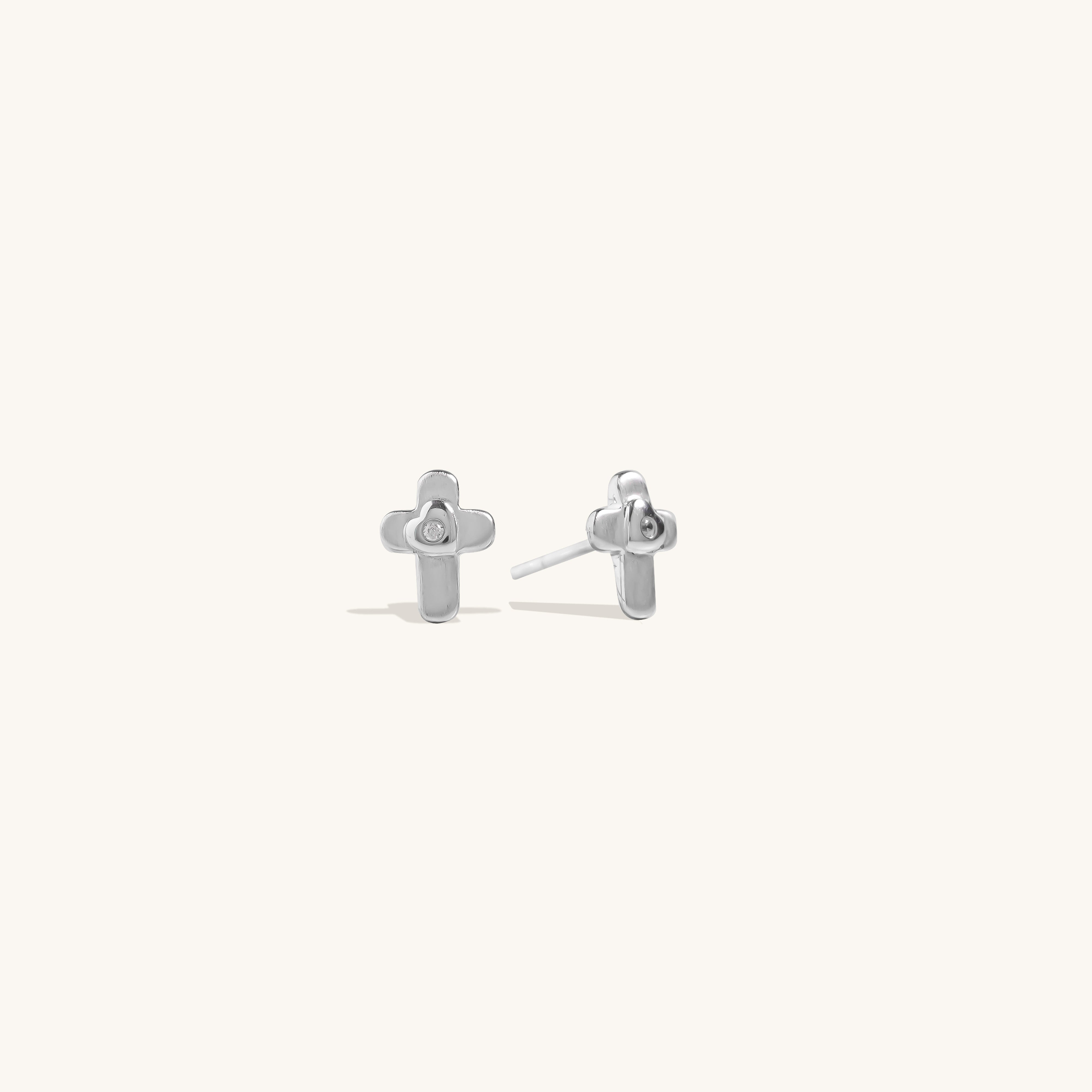 Brooklyn Cross Stud Earrings in sterling silver with cubic zirconia, shown close-up on neutral background for product detail clarity.