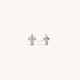 Cute silver cross stud earrings for girls ages 7 and up, featuring sparkly accent gems - stylish, age-appropriate faith jewelry for juniors that's both playful and meaningful.