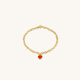 Red Central Heart Bracelet in vermeil with rolo chain and red enamel heart charm, displayed flat on neutral background for clear product detail.