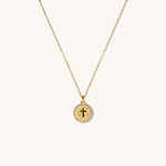 Gold vermeil kids cross pendant necklace with round medallion design and sparkling cubic zirconia halo, religious children’s jewelry gift for faith-inspired occasions.